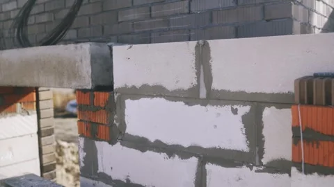 Building construction developing house walls with aerated concrete blocks 動画素材 326067785