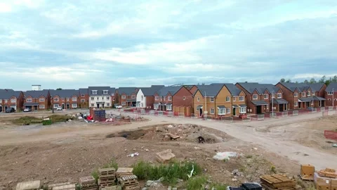 Building construction development site aerial view rising towards the new houses 库存影片 342408634