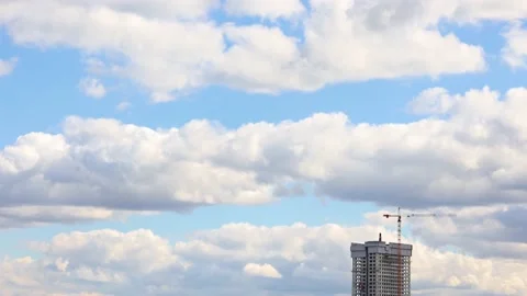 BUILDING CONSTRUCTION. Isolated. With a working crane on the roof of a Stock Footage 207869068