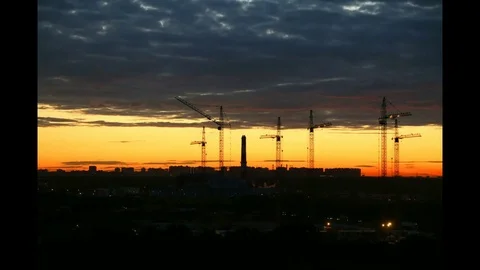 Building construction with many cranes on horizon Time-lapse. Construction site Stock Footage 78940248