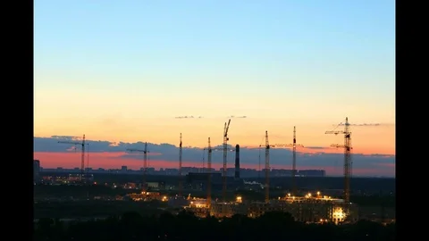 Building construction with many cranes on horizon Time-lapse. Construction site Stock Footage 78940309