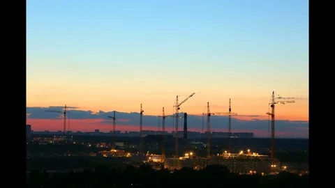 Building construction with many cranes on horizon Time-lapse. Construction site Video stock 78940362