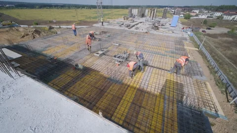 Building construction on monolithic technology. Construction of the building. Vídeos de archivo 255314529