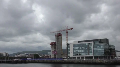 Building construction moving crane river stormy Stock Footage 74161702