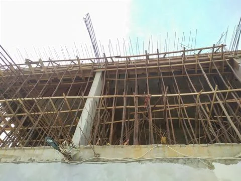 The building construction process is almost complete Stock Photos