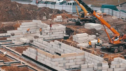 Building construction process. Foundation laying Stock Footage 105960110