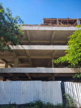 Building construction in progress in an urban location Stock Photos