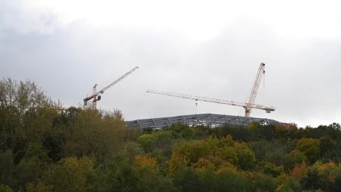 Building construction site in a cloudy day Stock Footage 261730136