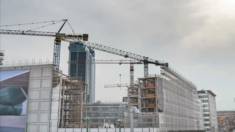 Building construction site with moving cranes. Time lapse. Stock Footage 149813675
