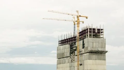 Building construction on a sky background. Stock Photos