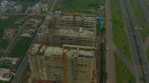 Building construction top view at the city in india Stock Footage 221736771