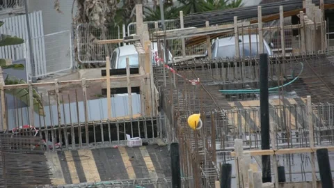 Building construction work. yellow safety helmet on the construction  Vídeos de archivo 232945839