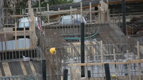 Building construction work. yellow safety helmet on the construction  Vídeos de archivo 232945840