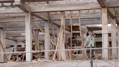  Building contractor laying blocks with mortar and trowel Stock Footage 199310160