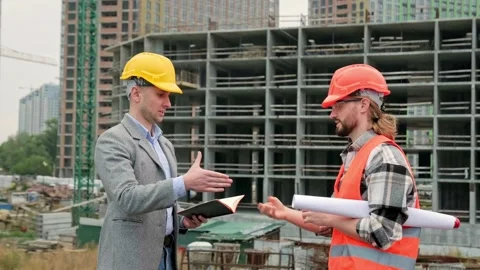 Building contractors exchanging handshake after site inspection Stock Footage 274393725
