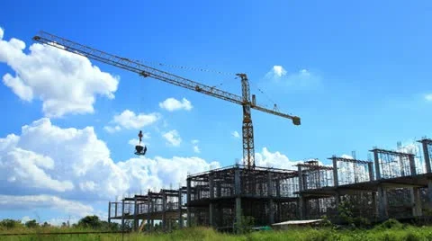 Building crane against blue sky and cloud running Stock Footage 12374331