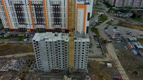 Building crane and building under construction. Construction site. Construction 스톡 동영상 113579168