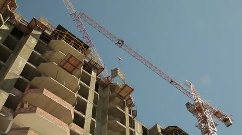 The building crane on a background of building under construction Видео 38547308