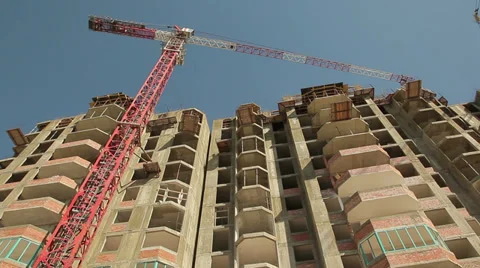 The building crane on a background of building under construction Видео 38548713