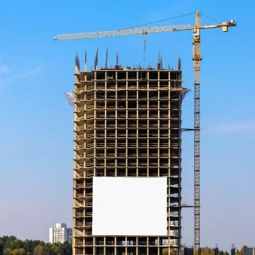 Building crane on construction Stock Photos
