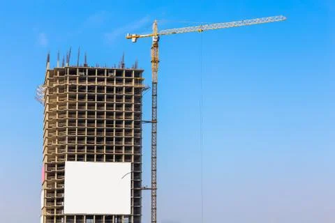 Building crane on construction Stock Photos