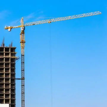 Building crane on construction Stock Photos