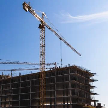 Building crane on construction Stock Photos