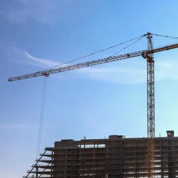 Building crane on construction Stock Photos