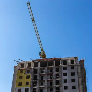 Building crane on construction Stock Photos
