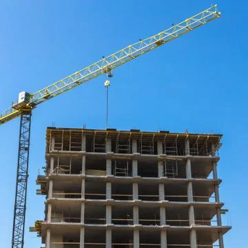 Building crane on construction Stock Photos