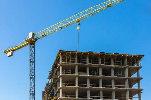 Building crane on construction Stock Photos