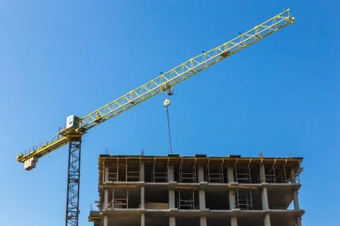 Building crane on construction Stock Photos