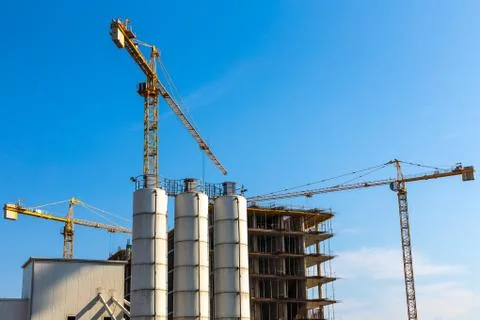 Building cranes on construction Stock Photos