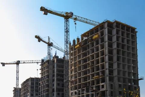 Building cranes on construction Stock Photos