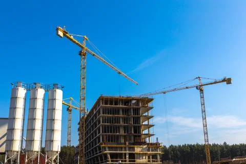 Building cranes on construction Stock Photos