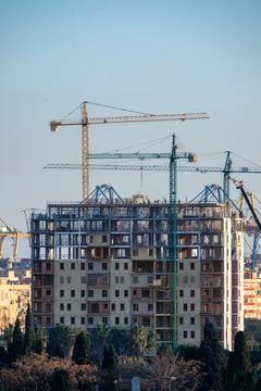 Building with cranes Stock Photos