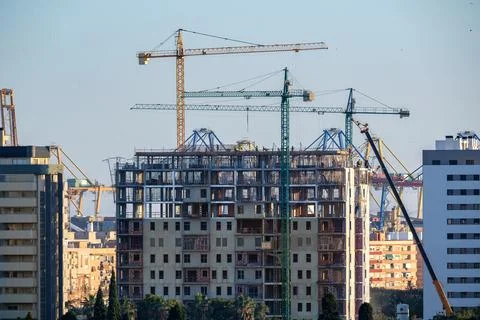 Building with cranes Stock Photos