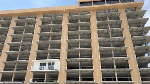 Building damaged by hurricane Nicole Stock Footage 237129364