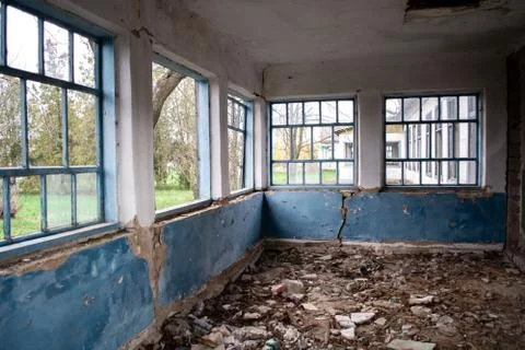 Building damaged by war. broken windows, cracked walls, Stock Photos