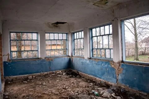 Building damaged by war. broken windows, cracked walls, Stock Photos