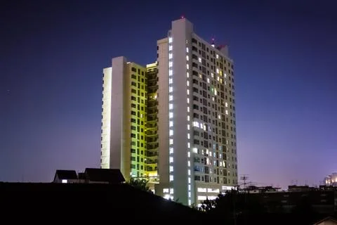 Building in the dark night. Stock Photos