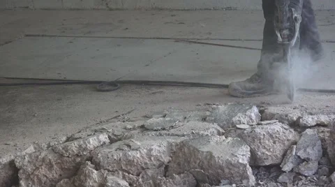Building demolition jack hammer drill breaking concrete Stock Footage
