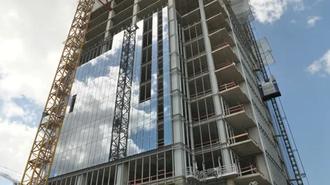 Building during construction half covered with glass Stock Footage 110910573