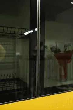 Building an efficient display case with glass doors in a kitchen environmen.. Stock-Fotos