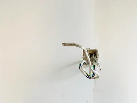 Building electrical system on cement wall Stock Photos