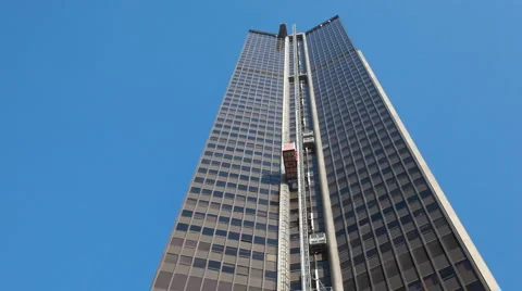 Building with elevator takes on its outer wall Stock Footage 1104770