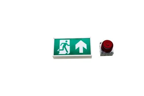Building Emergency Exit with Exit Sign and Fire Extinguisher. stairwell fire Stock Photos