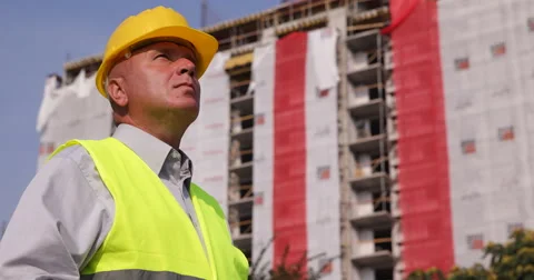 Building Engineer Looking Construction Site Supervise Workers Team Activity Stock Footage 59526133