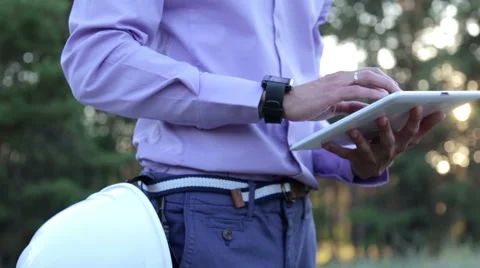 Building Engineer Works on the Tablet Stock Footage 66724341