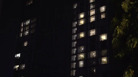 Building exterior in the evening with interior lights Stock Footage 77643469